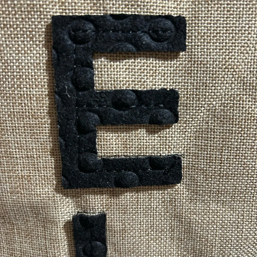 Black and Tan Welcome Sign